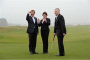 3 April 2014; George O'Grady, Chief Executive of the European Tour, Arlene Foster, MLA, Minister of Enterprise Trade and Investment of the Northern Ireland Executive, and Peter Robinson, MLA, Northern Ireland First Minister, on the 18th green after an Irish Open press conference. Royal County Down Golf Course, Newcastle, Co. Down. Picture credit: Oliver McVeigh / SPORTSFILE