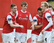 4 April 2014; St Patrick's Athletic's Chris Forrester, second from left, celebrates after scoring his side's first goal with team-mates, from left, Ian Bermingham, Christy Fagan and Derek Foran. Airtricity League Premier Division, St Patrick's Athletic v Dundalk, Richmond Park, Dublin. Picture credit: David Maher / SPORTSFILE