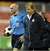 4 April 2014; Referee Padraic Sutton, with St Patrick's Athletic manager Liam Buckley at the end of the game. Airtricity League Premier Division, St Patrick's Athletic v Dundalk, Richmond Park, Dublin. Picture credit: David Maher / SPORTSFILE