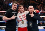 4 April 2014; Carl Frampton, with trainer Shane McGuigan, left, and manager Barry McGuigan after after victory over Hugo Cazares in Round 2 of their WBC super-bantamweight title final eliminator bout. This is Belfast Fight Night, Odyssey Arena, Belfast, Co. Antrim. Picture credit: Ramsey Cardy / SPORTSFILE
