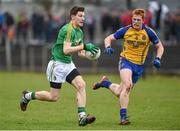 5 April 2014; Shane Quinn, Leitrim, in action against Fintan Kelly, Roscommon. Cadbury Connacht GAA Football U21 Championship Final, Leitrim v Roscommon, Páirc Sean Mac Diarmada, Carrick on Shannon, Co. Leitrim. Photo by Sportsfile