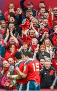 5 April 2014; Munster supporters celebrate after Casey Laulala score their side's fourth try. Heineken Cup Quarter-Final, Munster v Toulouse. Thomond Park, Limerick. Picture credit: Stephen McCarthy / SPORTSFILE