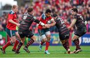 5 April 2014; Casey Laulala, Munster, is tackled by Cyril Baille, left, and Lionel Beauxis, Toulouse. Heineken Cup Quarter-Final, Munster v Toulouse. Thomond Park, Limerick. Picture credit: Stephen McCarthy / SPORTSFILE