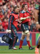5 April 2014; Peter O'Mahony, Munster, leaves the pitch with head of physiotherapy Anthony Coole after picking up an injury. Heineken Cup Quarter-Final, Munster v Toulouse. Thomond Park, Limerick. Picture credit: Stephen McCarthy / SPORTSFILE