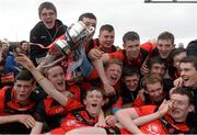 5 April 2014; The Coláiste Phobal team celebrate with the Paddy Buggy Cup. Masita GAA All-Ireland Post Primary Schools Paddy Buggy Cup Final, Coláiste Phobal, Ros Cré, Co. Tipperary v Cross & Passion, Ballycastle, Co Antrim. Nowlan Park, Kilkenny. Picture credit: Pat Murphy / SPORTSFILE
