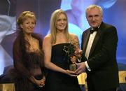 19 November 2005; Una Carroll, from Galway, is presented with her All Star award by An Taoiseach Bertie Ahern TD, and Geraldine Giles, President of the Ladies Gaelic Football Association, at the O'Neills TG4 Ladies GAA All-Star Awards. Citywest Hotel, Dublin. Picture credit: Brendan Moran / SPORTSFILE