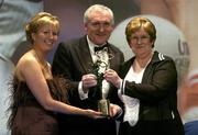 19 November 2005; Hall of Fame award winner Mary Wheatley from Laois is presented with her award by An Taoiseach Bertie Ahern TD and Geraldine Giles, President of the Ladies Gaelic Football Association, at the O'Neills TG4 Ladies GAA All-Star Awards. Citywest Hotel, Dublin. Picture credit: Brendan Moran / SPORTSFILE