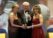 19 November 2005; Amanda Murphy, from Cork, is presented with her Munster Young Player of the Year award by An Taoiseach Bertie Ahern TD and Geradline Giles, President of the Ladies Gaelic Football Association, at the O'Neills TG4 Ladies GAA All-Star Awards. Citywest Hotel, Dublin. Picture credit: Brendan Moran / SPORTSFILE