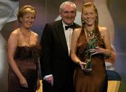 19 November 2005; Sarah Connolly, from Tyrone, is presented with her Ulster Young Player of the Year award by An Taoiseach Bertie Ahern TD and Geradline Giles, President of the Ladies Gaelic Football Association, at the O'Neills TG4 Ladies GAA All-Star Awards. Citywest Hotel, Dublin. Picture credit: Brendan Moran / SPORTSFILE