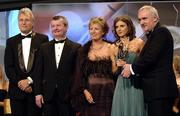 19 November 2005; Lorna Joyce, from Galway, 2nd from right, is presented with her All Star award by An Taoiseach Bertie Ahern TD, and Geraldine Giles, President of the Ladies Gaelic Football Association, in the company of Tony Towell of O'Neills, left, and Pol O Gallchoir of TG4, 2nd from left, at the O'Neills TG4 Ladies GAA All-Star Awards. Citywest Hotel, Dublin. Picture credit: Ray McManus / SPORTSFILE