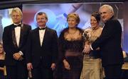 19 November 2005; Lyndsay Davey, from Dublin, 2nd from right, is presented with her All Star award by An Taoiseach Bertie Ahern TD, and Geraldine Giles, President of the Ladies Gaelic Football Association, in the company of Tony Towell of O'Neills, left, and Pol O Gallchoir of TG4, 2nd from left, at the O'Neills TG4 Ladies GAA All-Star Awards. Citywest Hotel, Dublin. Picture credit: Ray McManus / SPORTSFILE