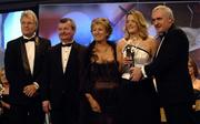 19 November 2005; Juliette Murphy, from Cork, 2nd from right, is presented with her All Star award by An Taoiseach Bertie Ahern TD, and Geraldine Giles, President of the Ladies Gaelic Football Association, in the company of Tony Towell of O'Neills, left, and Pol O Gallchoir of TG4, 2nd from left, at the O'Neills TG4 Ladies GAA All-Star Awards. Citywest Hotel, Dublin. Picture credit: Ray McManus / SPORTSFILE