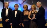 19 November 2005; Gemma Fay, from Dublin, 2nd from right, is presented with her All Star award by An Taoiseach Bertie Ahern TD, and Geraldine Giles, President of the Ladies Gaelic Football Association, in the company of Tony Towell of O'Neills, left, and Pol O Gallchoir of TG4, 2nd from left, at the O'Neills TG4 Ladies GAA All-Star Awards. Citywest Hotel, Dublin. Picture credit: Ray McManus / SPORTSFILE