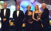 19 November 2005; Una Carroll, from Galway, 2nd from right, is presented with her All Star award by An Taoiseach Bertie Ahern TD, and Geraldine Giles, President of the Ladies Gaelic Football Association, in the company of Tony Towell of O'Neills, left, and Pol O Gallchoir of TG4, 2nd from left, at the O'Neills TG4 Ladies GAA All-Star Awards. Citywest Hotel, Dublin. Picture credit: Ray McManus / SPORTSFILE