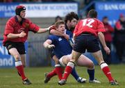 25 November 2005; Jason Harris-Wright, Leinster, is tackled by Richard Mullane, Munster. Schools Interprovincial, Leinster Schools U18 v Munster Schools U18, Donnybrook, Dublin. Picture credit: Brian Lawless / SPORTSFILE