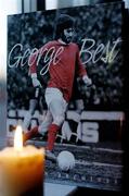 25 November 2005; Manchester Utd supporter Mick Dunne displays a shrine dedicated to the late George Best at his home in Swords, Co. Dublin. Picture credit: David Maher / SPORTSFILE