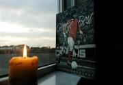 25 November 2005; Manchester Utd supporter Mick Dunne displays a shrine dedicated to the late George Best at his home in Swords, Co. Dublin. Picture credit: David Maher / SPORTSFILE