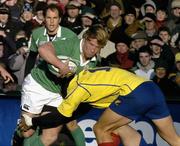 26 November 2005; Jerry Flannery, Ireland, is tackled by Costica Mersoiu, Romania. permanent tsb International Friendly 2005-2006, Ireland v Romania, Lansdowne Road, Dublin. Picture credit: Matt Browne / SPORTSFILE