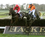 26 November 2005; Eventual winner Kerry Cottage, left, with B. M. Cash up and Icy Belle and MJ Ferris, clears the last in the Tattersalls Ireland EBF Mares Novice Steeplechase. Gowran Park, Co. Kilkenny. Picture credit: Dylan Vaughan / SPORTSFILE