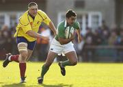 26 November 2005; Kieran Campbell, Ireland, is tackled by Florin Corodeanu, Romania. permanent tsb International Friendly 2005-2006, Ireland v Romania, Lansdowne Road, Dublin. Picture credit: Brian Lawless / SPORTSFILE