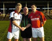 26 November 2005; Ciaran McDonald, Mayo News / O'Neills Club Stars, shakes hands with Mayo captain, James Gill, with referee Martin Murphy. Challenge Game, Mayo News / O'Neills Club Stars v Mayo XV, McHale Park, Castlebar, Co. Mayo. Picture credit: Damien Eagers / SPORTSFILE