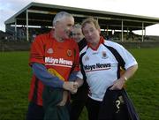 26 November 2005; Enda Kenny, T.D Fine Gael leader with Mayo manager Mickey Moran, left, congratulate each other on scoring a goal from a penalty. Challenge Game, Mayo News / O'Neills Club Stars v Mayo XV, McHale Park, Castlebar, Co. Mayo. Picture credit: Damien Eagers / SPORTSFILE