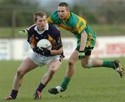 27 November 2005; Liam Og O'Heinneachain, Kilmacud Crokes, in action against Padraig Sullivan, Rhode. Leinster Club Senior Football Championship Semi-Final, Kilmacud Crokes v Rhode, St. Conleth's Park, Newbridge, Co. Kildare. Picture credit: David Maher / SPORTSFILE