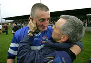 27 November 2005; Denis Russell, left and selector Noel Roche, St. Senans Kilkee, celebrate at the end of the game. Munster Club Senior Football Championship Semi-Final, St. Senans Kilkee v An Ghaeltacht, Cooraclare, Co. Clare. Picture credit: Kieran Clancy / SPORTSFILE