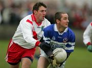 27 November 2005; Christy Kirwin, St. Senans Kilkee, in action against Tomas O'Conchuir, An Ghaeltacht. Munster Club Senior Football Championship Semi-Final, St. Senans Kilkee v An Ghaeltacht, Cooraclare, Co. Clare. Picture credit: Kieran Clancy / SPORTSFILE