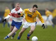 27 November 2005; Simon Kennedy, St Galls, in action against Declan Graffin, Bellaghy. Ulster Club Senior Football Championship Final, Bellaghy v St. Galls, Healy Park, Omagh, Co. Tyrone. Picture credit: Damien Eagers / SPORTSFILE