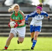 6 April 2014; Cora Staunton, Mayo, in action against Christine Reilly, Monaghan. TESCO Ladies National Football League, Round 7, Mayo v Monaghan, James Stephen's Park, Ballina, Co. Mayo. Picture credit: David Maher / SPORTSFILE
