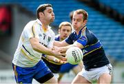 6 April 2014; Seanie Furlong, Wicklow, in action against John Coghlan, Tipperary. Allianz Football League, Division 4, Round 7, Tipperary v Wicklow, Semple Stadium, Thurles, Co. Tipperary. Picture credit: Matt Browne / SPORTSFILE