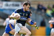 6 April 2014; Paddy Codd, Tipperary, in action against Paul Cunningham, Wicklow. Allianz Football League, Division 4, Round 7, Tipperary v Wicklow, Semple Stadium, Thurles, Co. Tipperary. Picture credit: Matt Browne / SPORTSFILE