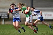 6 April 2014; Cora Staunton, Mayo, in action against Yvonne Connell, Monaghan. TESCO Ladies National Football League, Round 7, Mayo v Monaghan, James Stephen's Park, Ballina, Co. Mayo. Picture credit: David Maher / SPORTSFILE