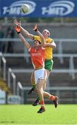 6 April 2014; Neil Gallagher, Donegal, contests a kickout with Stephen Harold, Armagh. Allianz Football League, Division 2, Round 7, Armagh v Donegal, Athletic Grounds, Armagh. Picture credit: Brendan Moran / SPORTSFILE