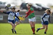 6 April 2014; Fiona McHale, Mayo, in action against Cora Courtney, left, and Aoife McAnespie, Monaghan. TESCO Ladies National Football League, Round 7, Mayo v Monaghan, James Stephen's Park, Ballina, Co. Mayo. Picture credit: David Maher / SPORTSFILE