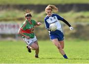 6 April 2014; Nicola Fahey, Monaghan, in action against Amy Bell, Mayo. TESCO Ladies National Football League, Round 7, Mayo v Monaghan, James Stephen's Park, Ballina, Co. Mayo. Picture credit: David Maher / SPORTSFILE