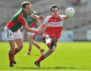 6 April 2014; Carlus McWilliams, Derry, in action against  Andy Moran, Mayo. Allianz Football League, Division 1, Round 7, Mayo v Derry, Elverys MacHale Park, Castlebar, Co. Mayo. Picture credit: Ray Ryan / SPORTSFILE