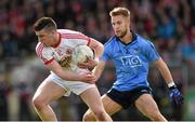 6 April 2014; Darren McCurry, Tyrone, in action against Jonny Cooper, Dublin. Allianz Football League, Division 1, Round 7, Tyrone v Dublin, Healy Park, Omagh, Co. Tyrone. Picture credit: Ray McManus / SPORTSFILE