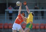 6 April 2014; Charles Vernon, Armagh, in action against Michael Murphy, Donegal. Allianz Football League, Division 2, Round 7, Armagh v Donegal, Athletic Grounds, Armagh. Picture credit: Brendan Moran / SPORTSFILE