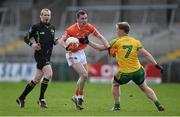 6 April 2014; Andy Mallon, Armagh, in action against Anthony Thompson, Donegal. Allianz Football League, Division 2, Round 7, Armagh v Donegal, Athletic Grounds, Armagh. Picture credit: Brendan Moran / SPORTSFILE