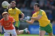 6 April 2014; Frank McGlynn, Donegal, in action against Kyle Carragher, Armagh. Allianz Football League, Division 2, Round 7, Armagh v Donegal, Athletic Grounds, Armagh. Picture credit: Brendan Moran / SPORTSFILE