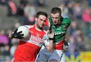 6 April 2014; Oisin Duffy, Derry, in action against Darren Coen, Mayo. Allianz Football League, Division 1, Round 7, Mayo v Derry, Elverys MacHale Park, Castlebar, Co. Mayo. Picture credit: Ray Ryan / SPORTSFILE