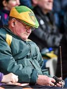 6 April 2014; A Donegal supporter listens to his radio during the game. Allianz Football League, Division 2, Round 7, Armagh v Donegal, Athletic Grounds, Armagh. Picture credit: Brendan Moran / SPORTSFILE