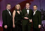 25 November 2005; Stephen O'Neill, of Tyrone, is presented with the Footballer of the Year by Teresa Elder, Chief Executive, Vodafone Ireland, and Noel Dempsey, TD, Minister for Communications, Marine and Natural Resources, at the 2005 Vodafone GAA All-Star Awards. Citywest Hotel, Dublin. Picture credit: Brendan Moran / SPORTSFILE