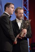 25 November 2005; Eoin Kelly, from Tipperary, is presented with his Vodafone All Star award by Sean Kelly, President of the GAA, at the 2005 Vodafone GAA All-Star Awards. Citywest Hotel, Dublin. Picture credit: Ray McManus / SPORTSFILE