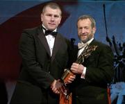 25 November 2005; Diarmuid O'Sullivan, from Cork, is presented with his Vodafone All-Star award by Sean Kelly, President of the GAA, at the 2005 Vodafone GAA All-Star Awards. Citywest Hotel, Dublin. Picture credit: Brendan Moran / SPORTSFILE