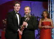 25 November 2005; Paul Kelly, from Tipperary, is presented with his Vodafone All-Star award by Sean Kelly, President of the GAA, at the 2005 Vodafone GAA All-Star Awards. Citywest Hotel, Dublin. Picture credit: Brendan Moran / SPORTSFILE