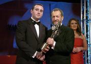 25 November 2005; Eoin Kelly, from Tipperary, is presented with his Vodafone All-Star award by Sean Kelly, President of the GAA, at the 2005 Vodafone GAA All-Star Awards. Citywest Hotel, Dublin. Picture credit: Brendan Moran / SPORTSFILE