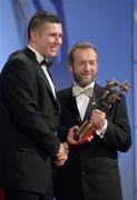 25 November 2005; Sean Cavanagh, from Tyrone, is presented with his Vodafone All-Star award by Sean Kelly, President of the GAA, at the 2005 Vodafone GAA All-Star Awards. Citywest Hotel, Dublin. Picture credit: Ray McManus / SPORTSFILE